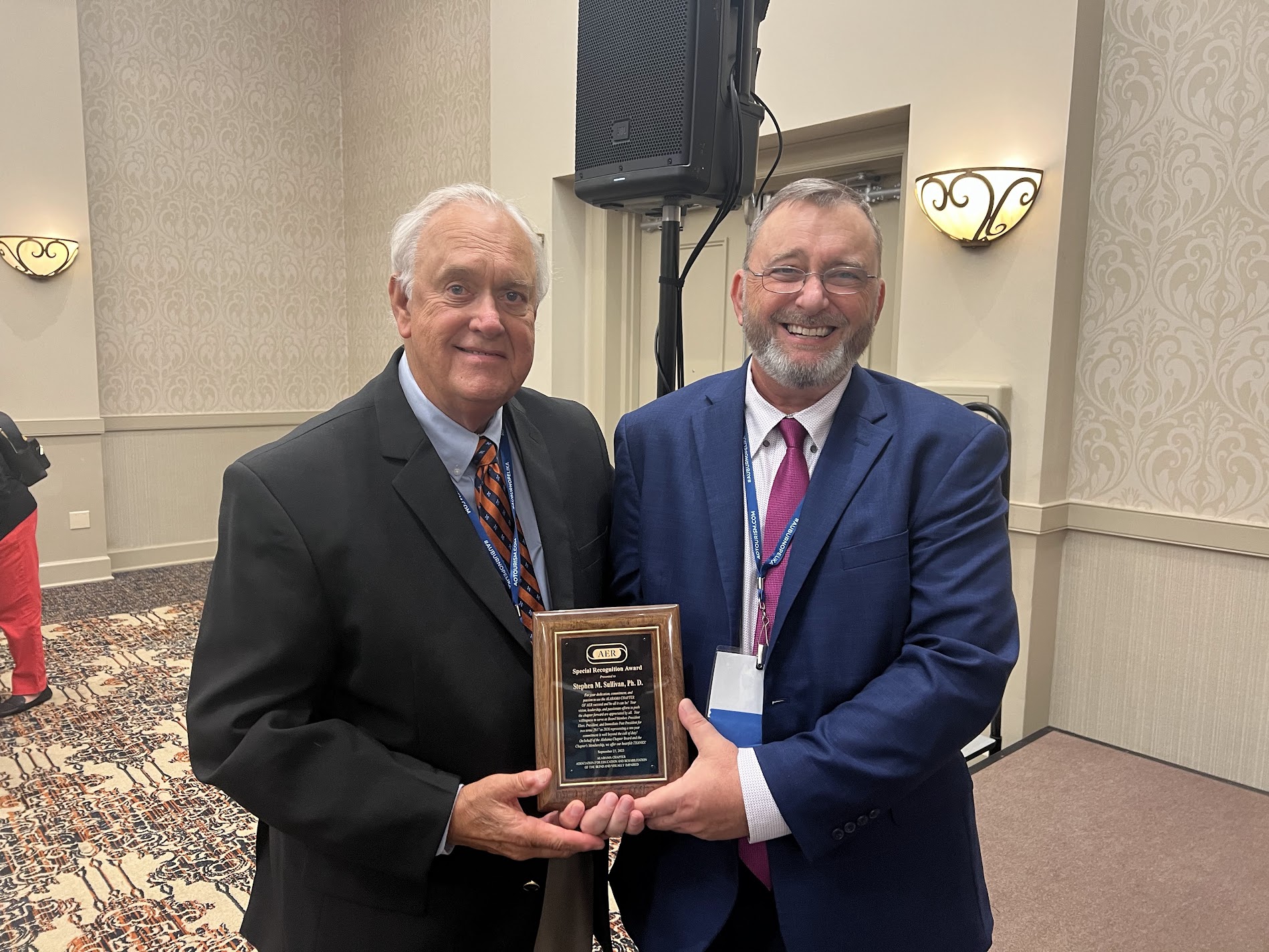 Joe Helm, AER Treasurer, presents Special Recognition Award to Dr. Stephen M. Sullivan Alabama Chapter President