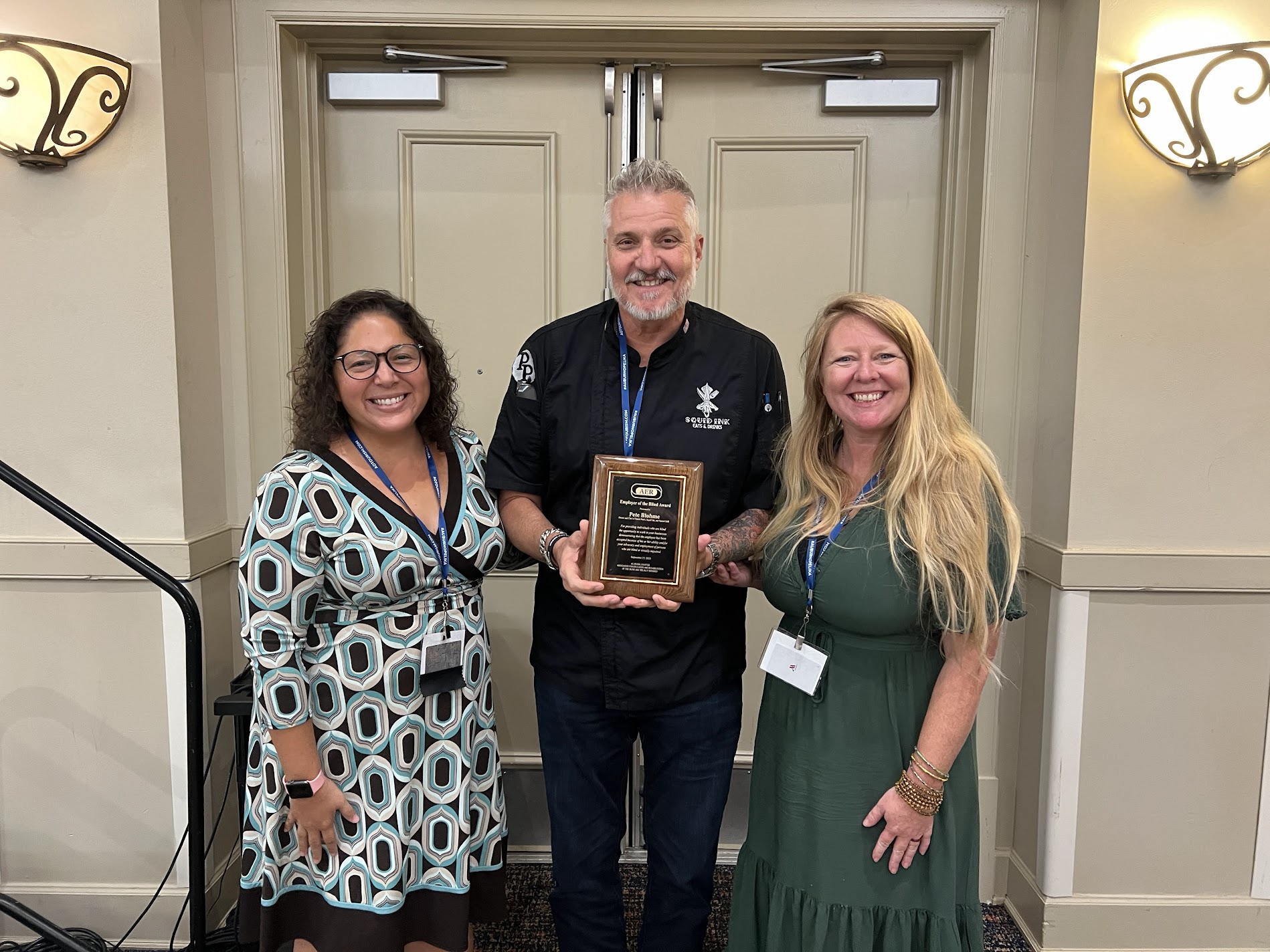 AL AER Board Member Kellee Malinauskas presented the Employer of the Year Award to Pete Blohme 